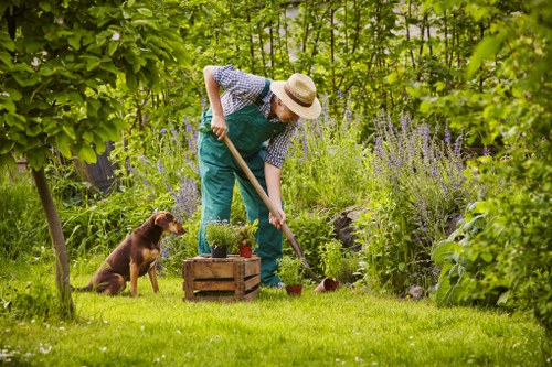 Technician preparing lawn mower at a Canary Wharf garden